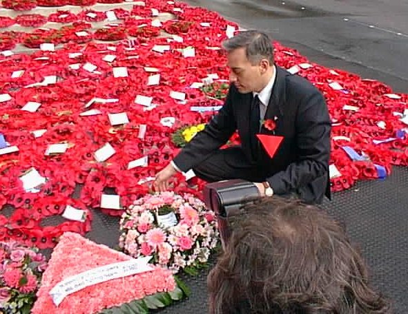 David Christmas lays the Pink Triangle Trust wreath