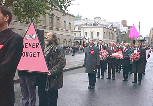 Queer Contingent pauses in Whitehall, with Nelson's Column in the background