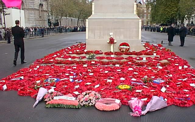 Queer Tributes with others at the Cenotaph, as marchers return